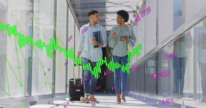 Image of numbers, diverse coworkers with trolley bag discussing while walking in corridor