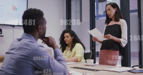 Naklejka premium Image of data processing over diverse business people in office