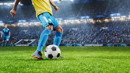 Fototapeta premium Aesthetic Shot Of Athletic Hispanic Footballer Shooting A Penalty Kick On Stadium With Crowd Cheering. Player Scoring a Goal At International Soccer Championship Final Match With Fans On Tribune