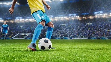 Fotobehang Aesthetic Shot Of Athletic Hispanic Footballer Shooting A Penalty Kick On Stadium With Crowd Cheering. Player Scoring a Goal At International Soccer Championship Final Match With Fans On Tribune © Gorodenkoff
