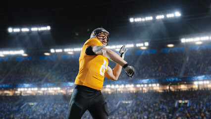 Aesthetic Shot of American Football Player Throwing a Ball on Stadium With Crowd. International...