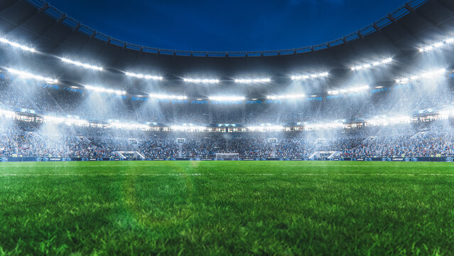 Aesthetic Shot of a Big and Empty Soccer Football Stadium With Crowd Of Fans Cheering in Excitement Before the Match. Lights Are Shining on The Sports Arena Grass Field. Sold Out Stadium Concept.