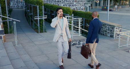 Business men, phone call and talking in city on commute to work in metro with discussion, chat and walking. People, staff and employees with digital touchscreen, bag or advice with travel on sidewalk