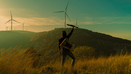 silhouette of person with turbine