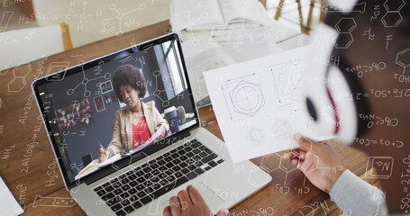 Image of marhematical equations over diverse business people having image call