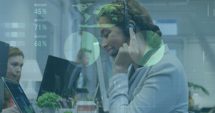 Image of data processing over biracial businesswoman using phone headset in office