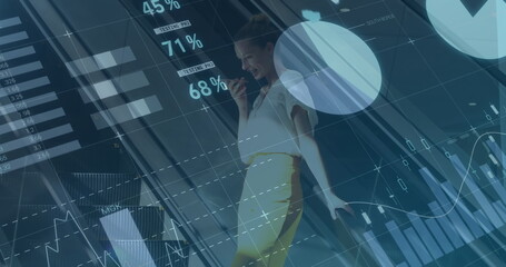 Image of financial data processing over caucasian businesswomen