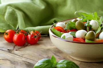 mozzarella cheese for salad with tomatoes and basil