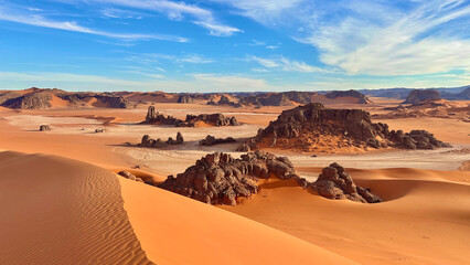Scenic view of sandy dunes in a sunny desert - obrazy, fototapety, plakaty