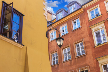 Cityscape - view of old buildings on narrow streets in the Old Town of Warsaw, Poland