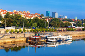 Cityscape - view of the district of Srodmiescie with the Old Town in the center Warsaw from the Vistula River, Poland