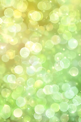 Fototapeta premium Yellow and Green Glittering Lights with Dreamy Bokeh, banner, background for event invitation, New Year's or Christmas decoration, Party Time, Festival St Patrick Day, Holiday, Space for text