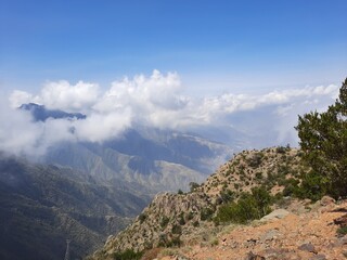 Mesmerizing natural beauty of Abha in Saudi Arabia in the summer season. High mountains, greenery, low clouds and fog are the beauty of Abha.