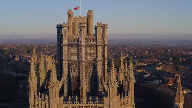 Aerial front lit close up Cathedral of Ely in city of Cambridgeshire, England, UK. Famous travel destination and anglican churches architecture 