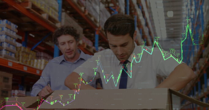 Image of financial data processing over two caucasian male supervisors opening a delivery box