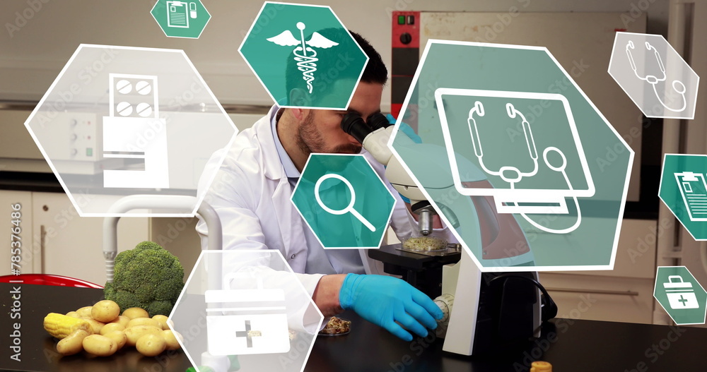 Poster image of scientific icons in hexagons over caucasian male lab worker using microscope