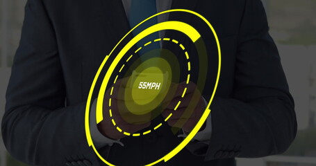 Image of speedometer over hands of caucasisn man using smartphone