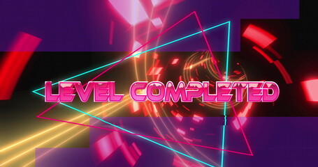 Image of level completed text over neon tunnel
