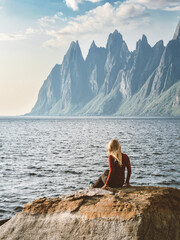 Woman traveler exploring Norway traveling solo summer vacations healthy lifestyle outdoor, girl...