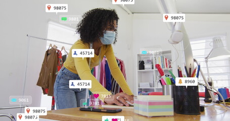 Image of network of connections over happy caucasian woman using smartphone and laptop