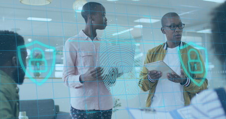Image of fingerprint over african american business people in office