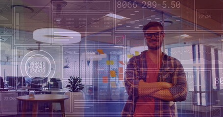 Image of financial data processing over caucasian businessman working at office