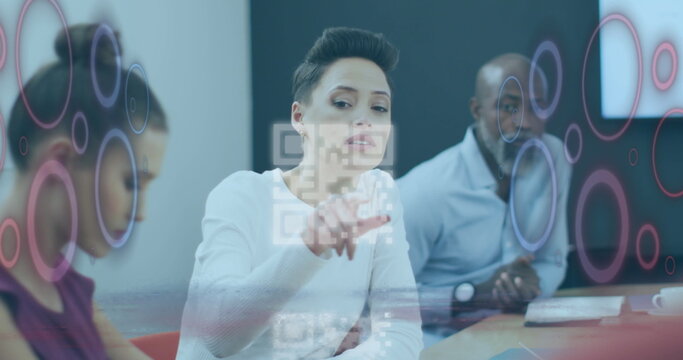 Image of qr code and data processing over diverse business people in office - Powered by Adobe