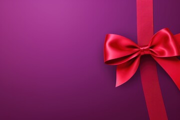 Red ribbon with bow on purple background, Christmas card concept. Space for text. Red and Purple Background
