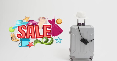 Image of sale text with icons over suitcase on blue background