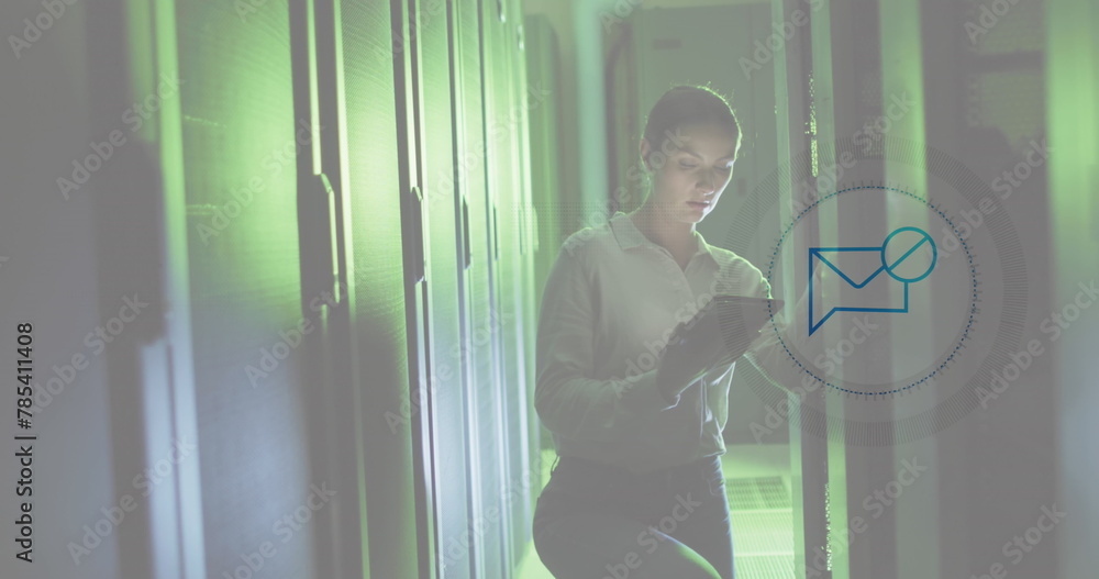 Poster image of message block icon over caucasian female engineer using digital tablet at server room