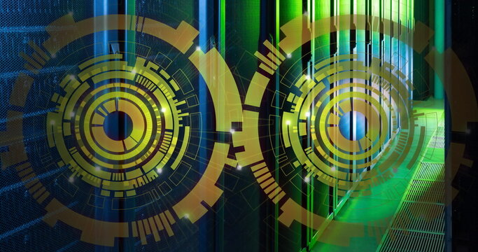 Image of two round scanners spinning against computer server room