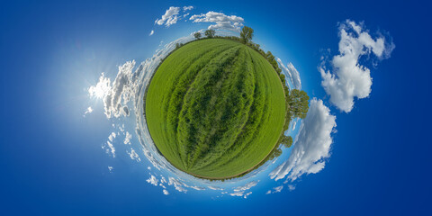 in the center of a green field lampertheim germany hessen 360° little planet altitude 125 meter