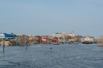 flood in Orenburg, the Urol river overflowed its banks and flooded the embankment and residential buildings