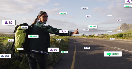 Image of multiple notification bars over biracial woman raising stop to take lift at highway