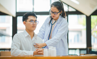 Doctors are inquiring about the patient's symptoms, notifying the results of the physical...