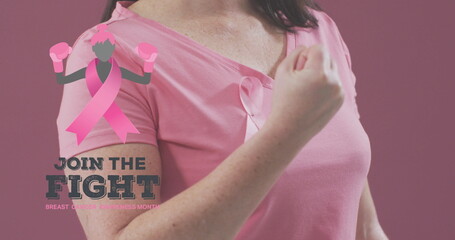 Join the fight with female boxer icon against mid section of woman wearing pink ribbon on her chest - Powered by Adobe