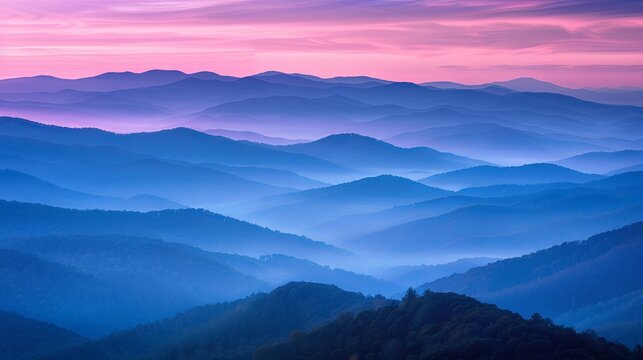 Serene twilight hues over layered mountain landscape