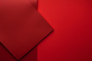Red background with dark red paper on the right side, minimalistic background, copy space concept, top view, flat lay