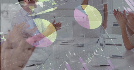 Image of statistics and data processing over diverse business people