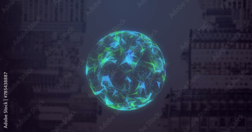 Poster image of globe made of shapes rotating over computer hardware