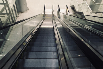 Looking down at the Escalator - Stock Image