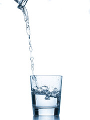 water splashing from glass isolated on white background