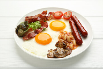 Delicious breakfast with sunny side up eggs on white wooden table, closeup