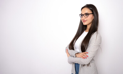 Portrait of Young satisfied smiling happy fun cheerful successful european employee woman 20s she wearing casual classic jacket looking side isolated on white background.