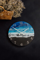 Wall clock. Round clock made of epoxy resin. Sea and waves