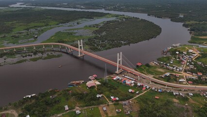 Aerial view of bridge Nanay Iquitos amazona - obrazy, fototapety, plakaty