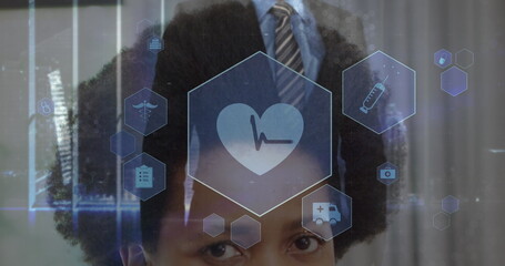Image of cropped multiracial woman and midsection of businessman touching icon in hexagons - Powered by Adobe