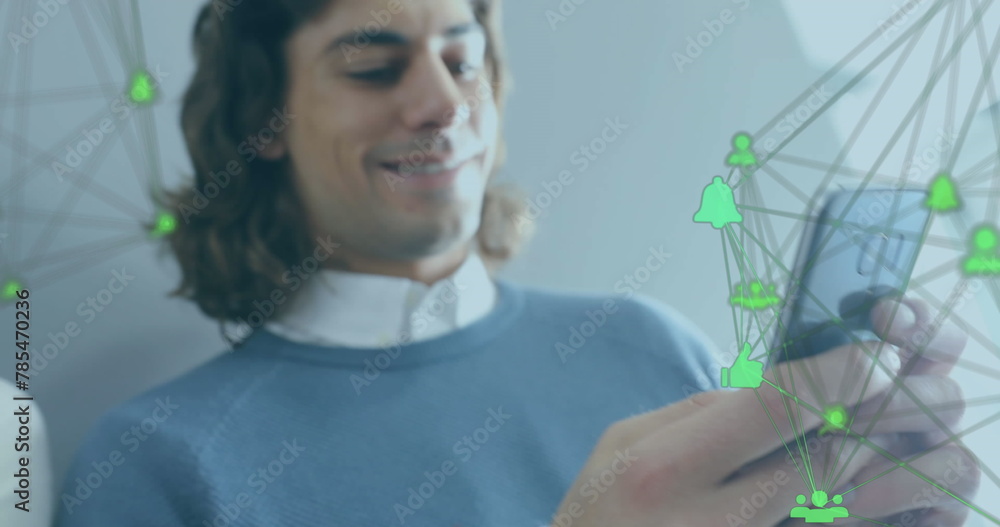 Poster image of globe of connections with icons over businessman using smartphone