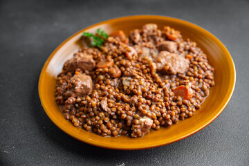 lentils with meat beef or pork fresh cooking appetizer meal food snack on the table copy space food background rustic
