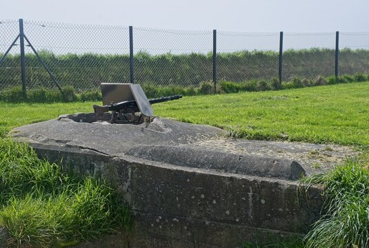 Plougonvelin, France - Apr 7, 2024: MG42 machine gun nest. Graf Spee Battery Fire Control Post during the Second World War. Sunny spring day. Selective focus.
